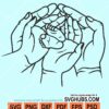 Baby feet in hands svg