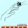 Woman hand with dog paw svg