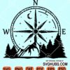 Compass with mountain and forest scenery svg