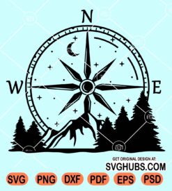 Compass with mountain and forest scenery svg